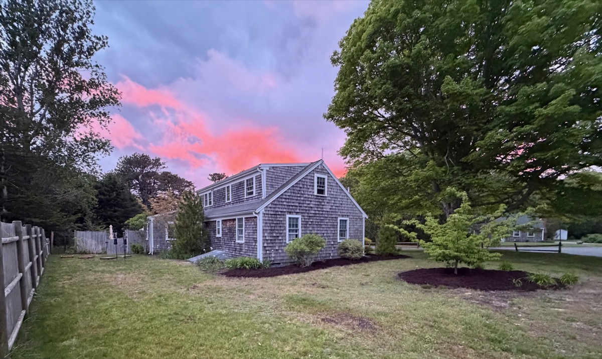 House at sunset with pink sky