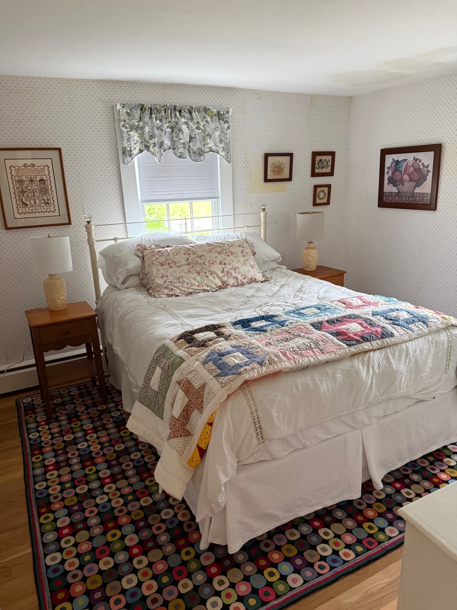 First-floor bedroom with queen bed