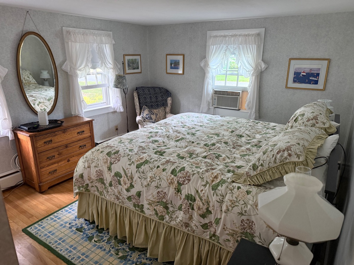 First-floor master bedroom with king bed