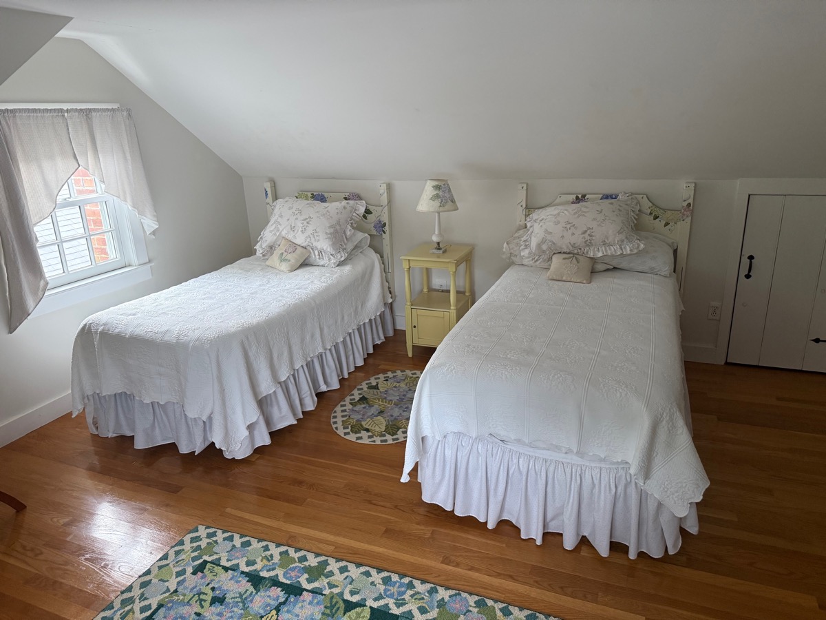 Upstairs bedroom with twin beds